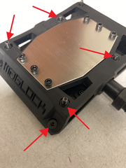 Stealth pedals image indicating grip screw locations