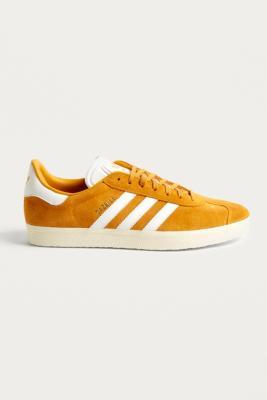 gold trainers mens