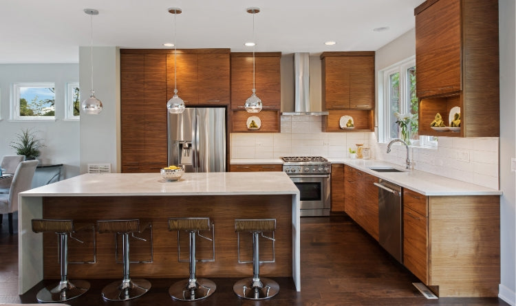 The 8 Most Common Types of Kitchen Cabinet Materials and How to Care for Them. photo showing wood veneer cabinets