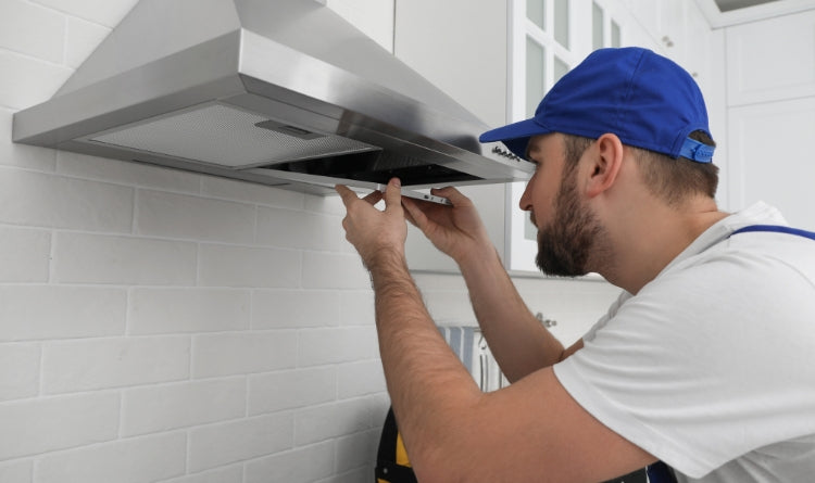 What is a product protection plan? image showing couple having breakfast with their range hood and researching on the computer