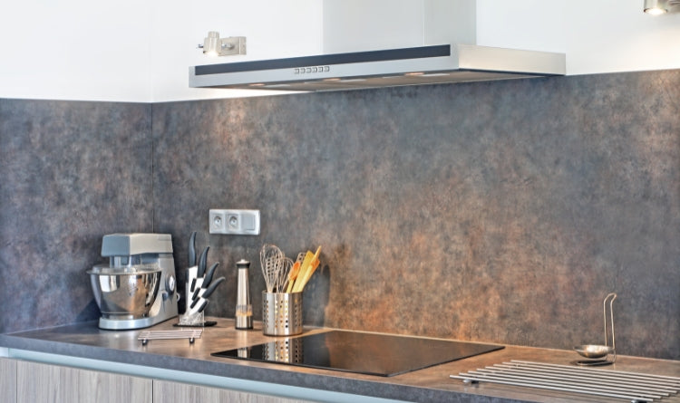 advantage of hardwiring a range hood. image showing an uninstalled wall mount range hood