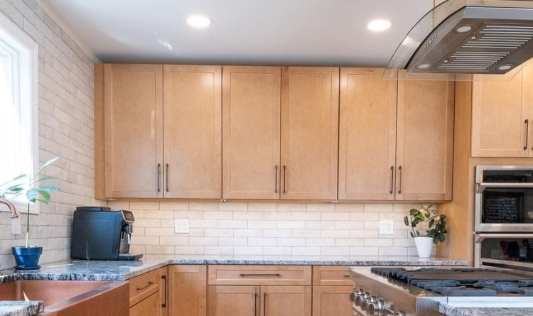 Island Range Hoods: A Focal Points in the Kitchen. image showing a kitchen range hood and kitchen sink area