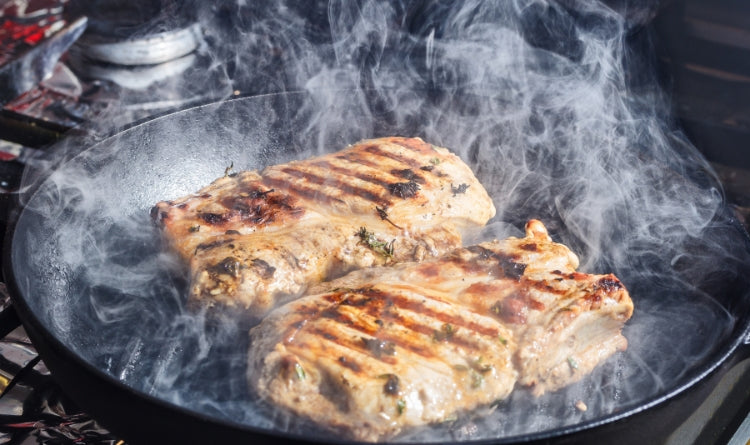 How to keep your kitchen air clean for your health hauslane photo of a steak cooking and lots of smoke