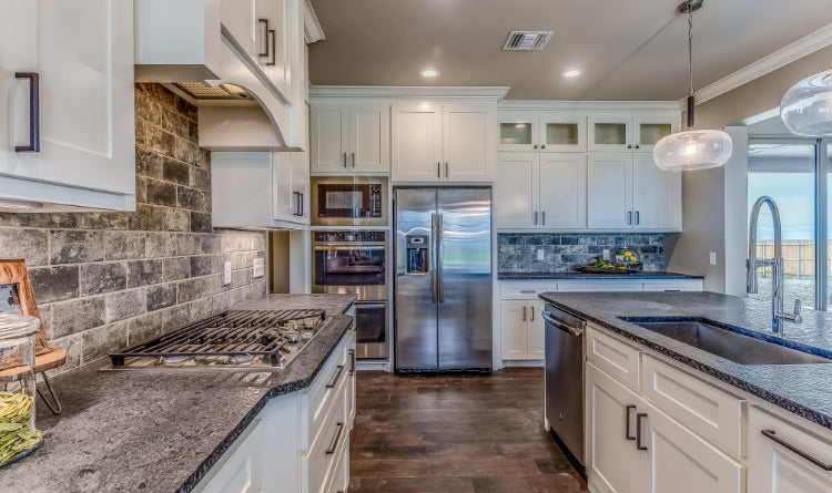 A custom range hood cover with range hood insert