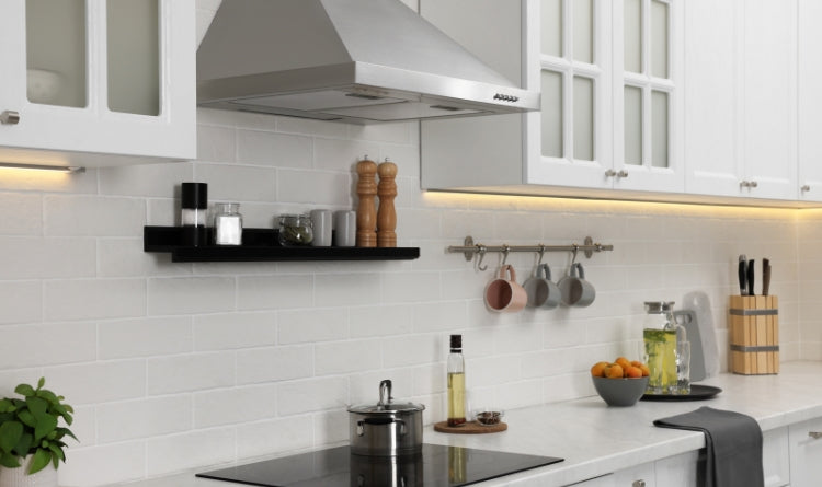 5 Ways to Clean Stainless Steel with Ingredients You Already Have at Home image showing a stainless steel range hood