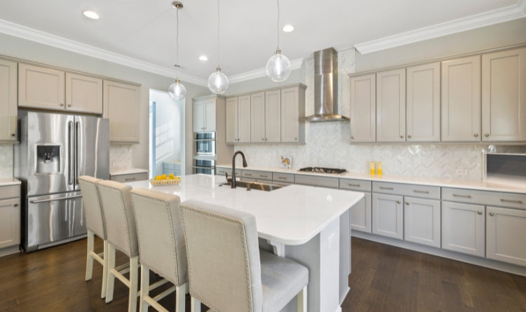 Revamping Your Kitchen: How to Incorporate Shaker Cabinets into Your Kitchen photo showing a beautiful light brown wood shaker cabinet kitchen