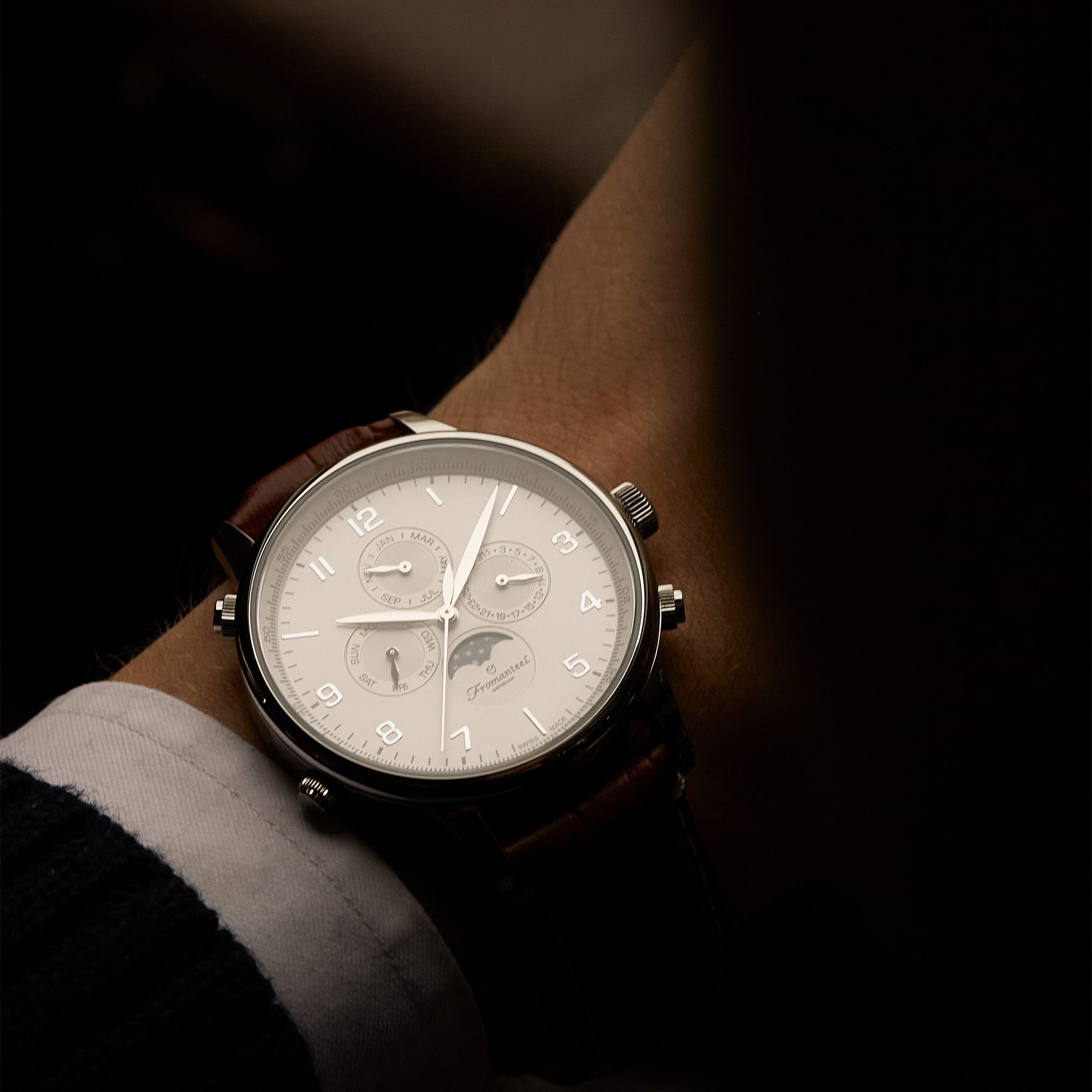 Photo by Fromanteel Watches on January 23, 2023. An image of the Moonphase wrist watch on a male wrist.