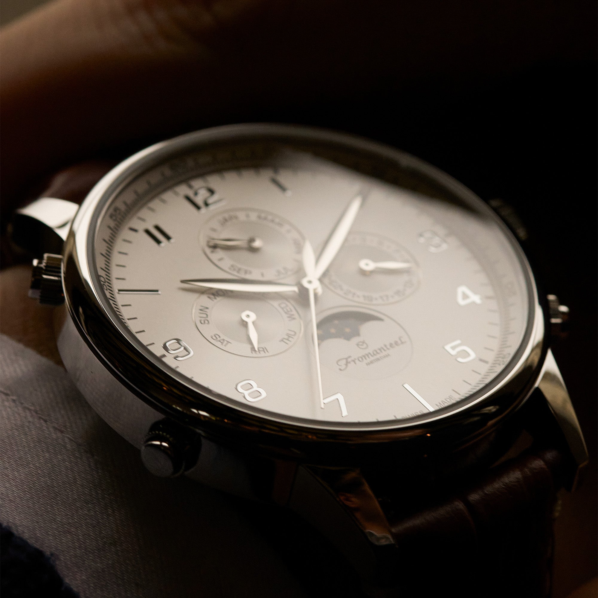 Photo by Fromanteel Watches on January 23, 2023. An image of the Moonphase wrist watch on a male wrist.