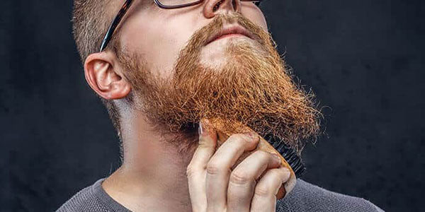 Man Touching His Beard