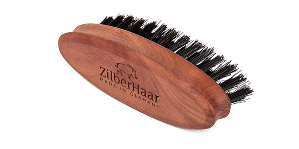Get a good beard or comb brush