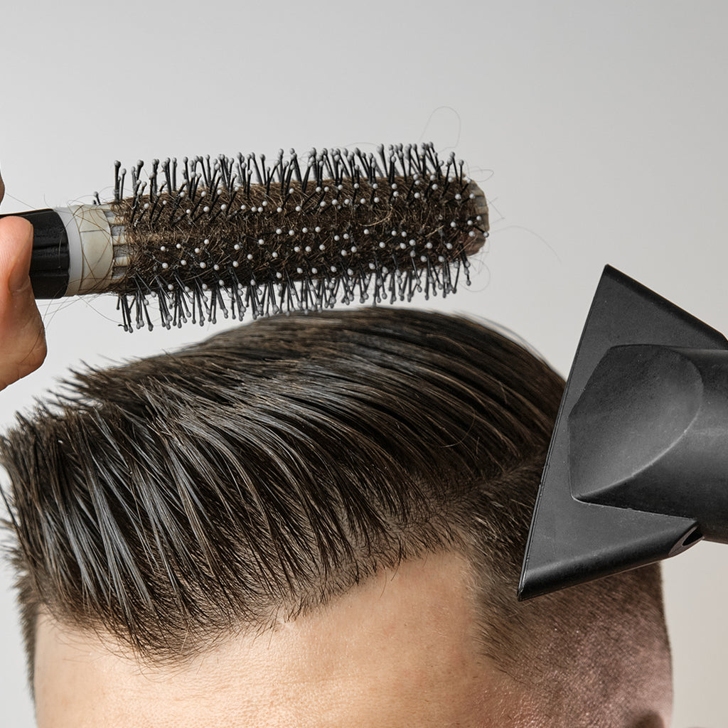 Man brushing hair