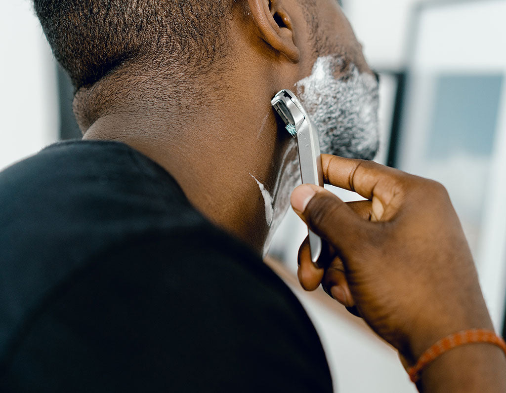 Man Shaving Beard