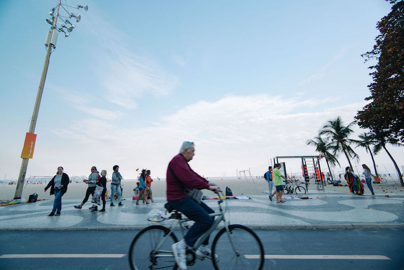 Man cycling through Sao Paolo