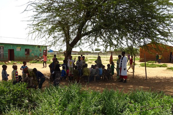 Melke Dhare learning before school was built