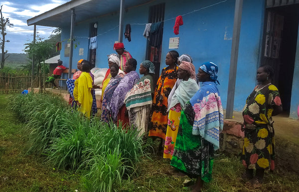 Women of Sizi, Ethiopia standing in front of their newly built maternal health clinic