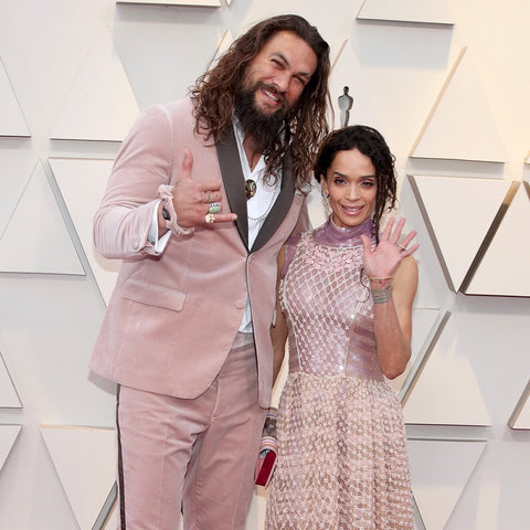 Jason Momoa wearing Karl Largerfeld scrunchie on the red carpet at the Oscars 2019