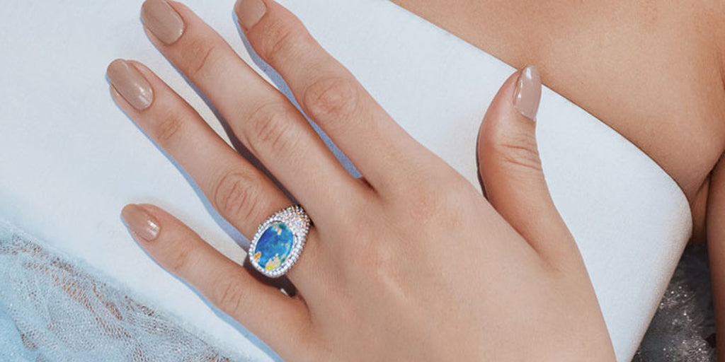 https://ztr5yjhdmrno4e7e-1342996598.shopifypreview.com/collections/all/products/opal-and-diamond-bombe-ring