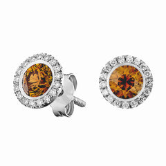 28727 14kt white gold halo earrings centered with 1.15 total carats of round brilliant cut orange colored diamonds surrounded by 0.34 total carats of round brilliant cut diamonds 