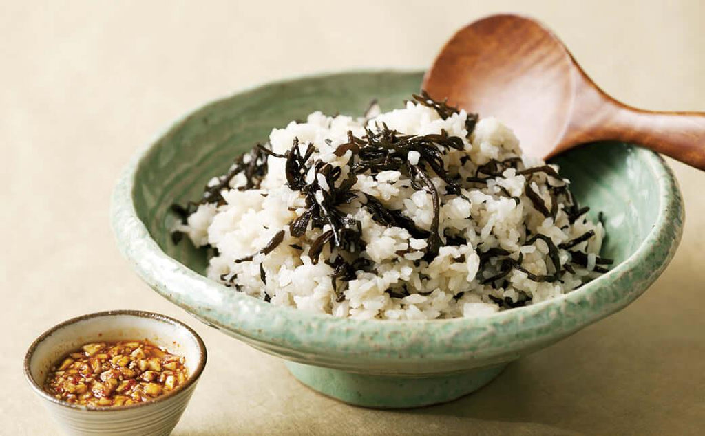 rice bowl with wooden spoon