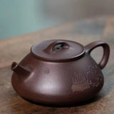 Zisha teapot by 实力派匠人 王萍 紫泥 “心舟石瓢”