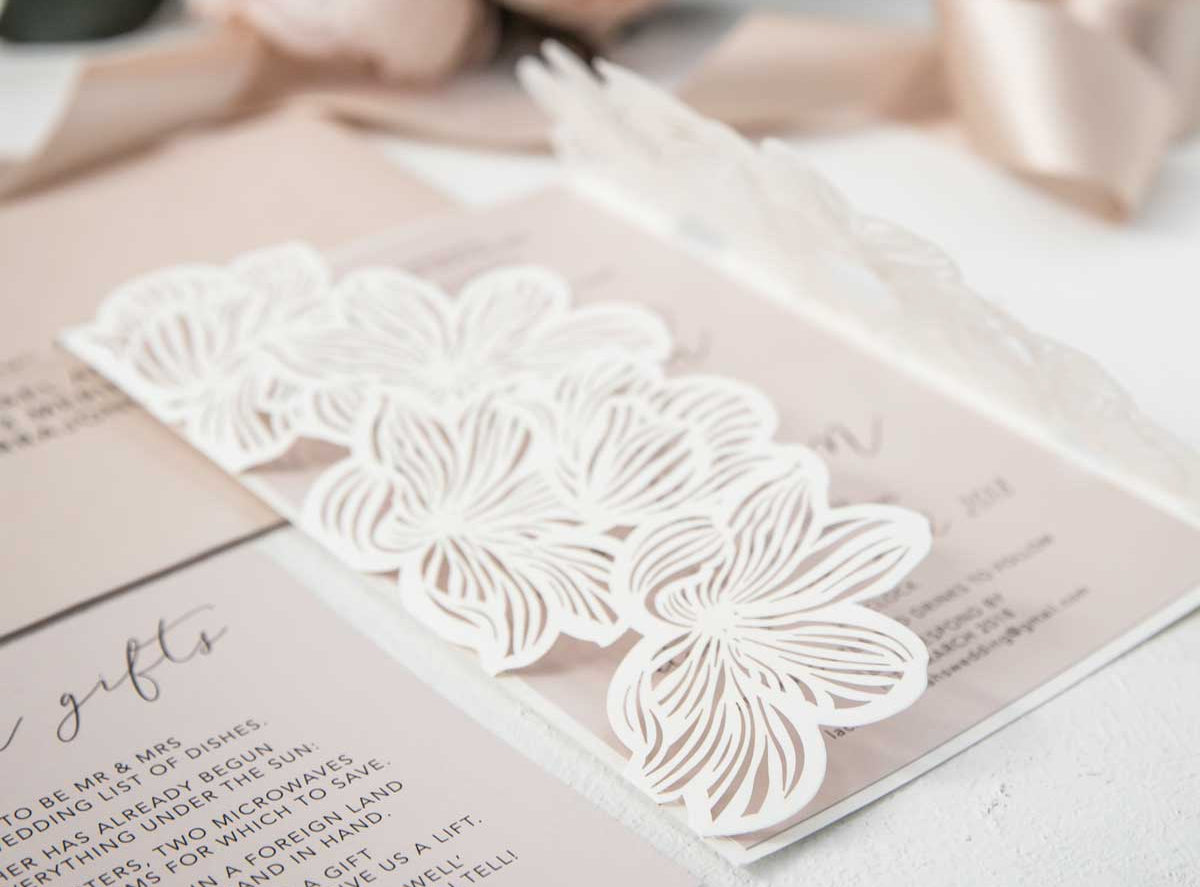 ivory laser-cut invitation