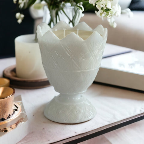 Milk glass candle on coffee table