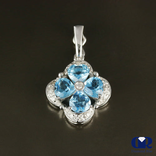 Blue Topaz & Diamond Pendant In 18K Gold