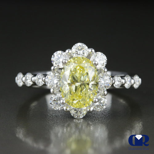 2.30 Carat Fancy Yellow Oval Diamond Halo Engagement Ring In 18K White Gold