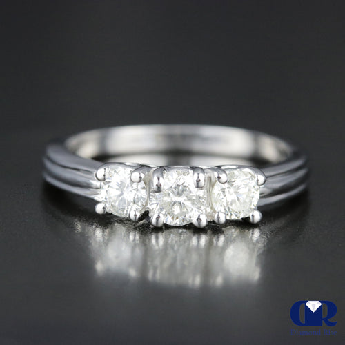 0.70 Carat Round Cut Diamond Three Stone Engagement Ring In 14K White Gold