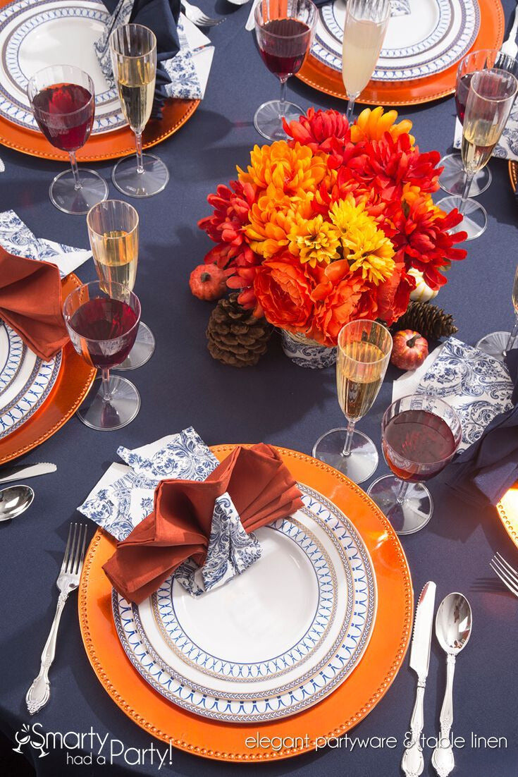 A beautifully arranged table setting showcasing Thanksgiving kitchen essentials, ideal for a festive Thanksgiving gathering.