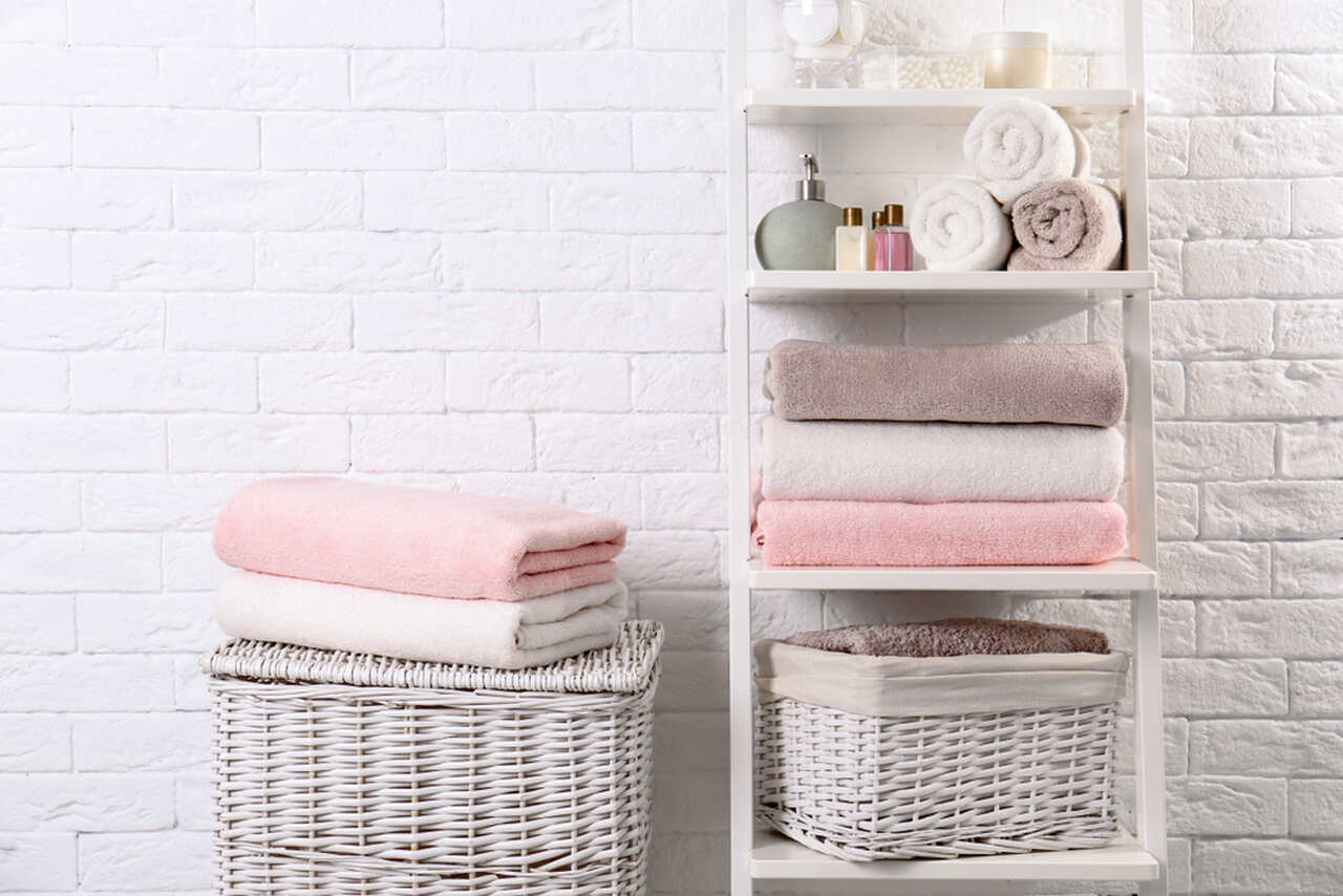 pink and white towels in a bathroom