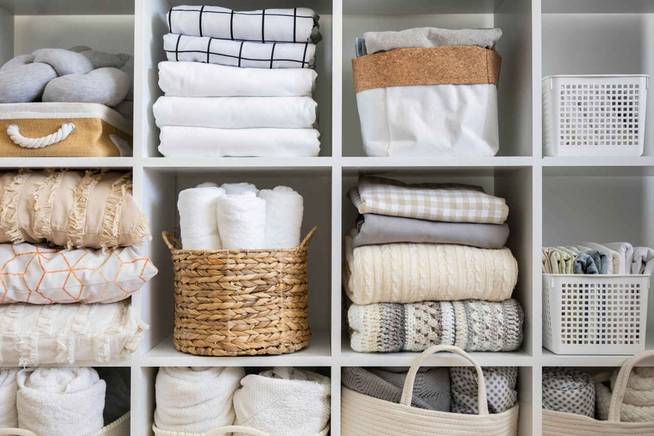 towels and other bathroom materials in a closet