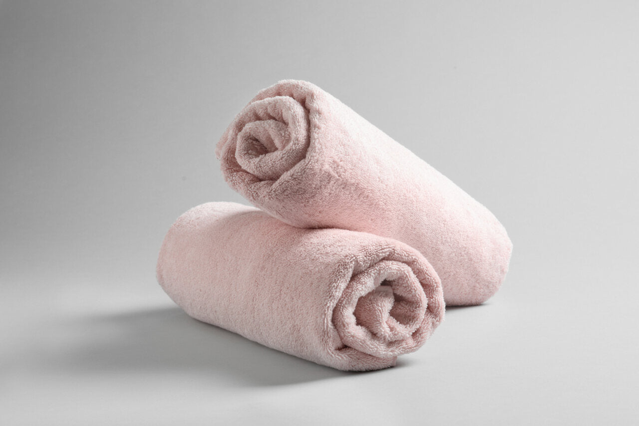 two pink towels together