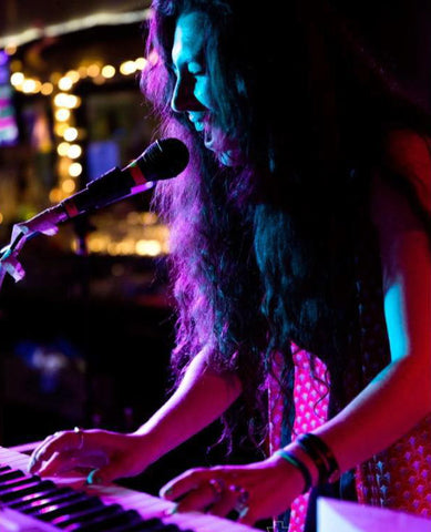 Sonya Singing and playing piano