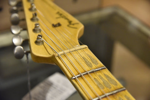 The bone nut on a Fender Custom Shop Stratocaster