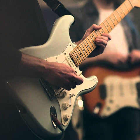 Guy Playing Guitar