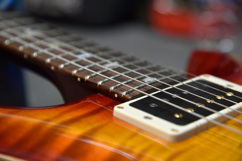 The frets on a 35h Anniversary PRS Custom 24