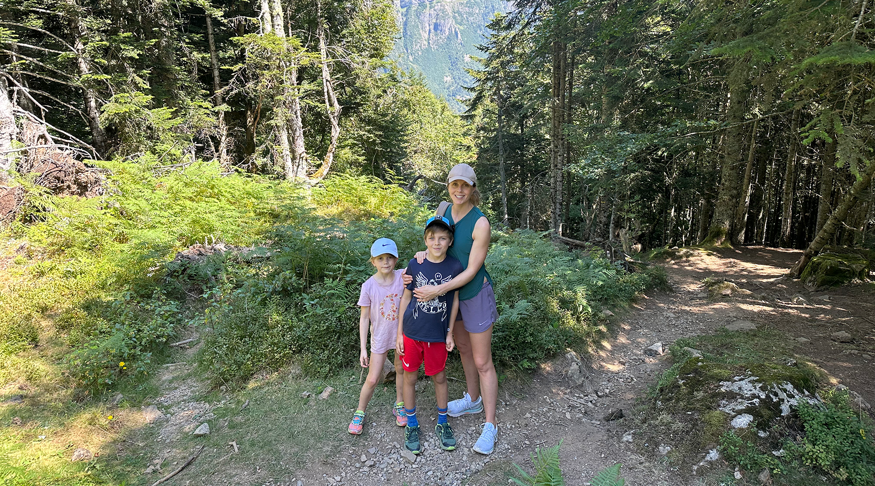 Photo of Lee and her children enjoying time in nature.