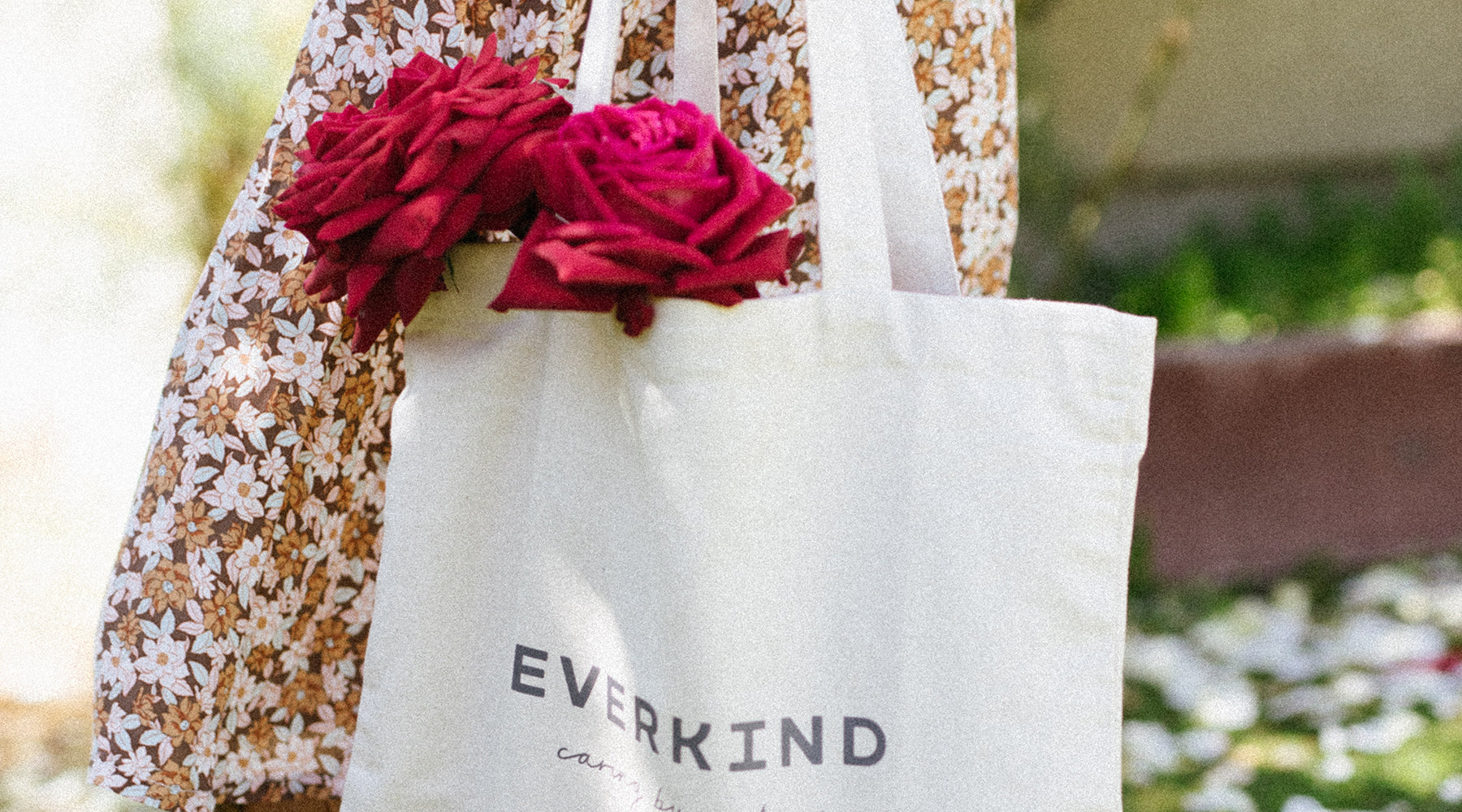 Everkind's organic tote bag with large red roses.