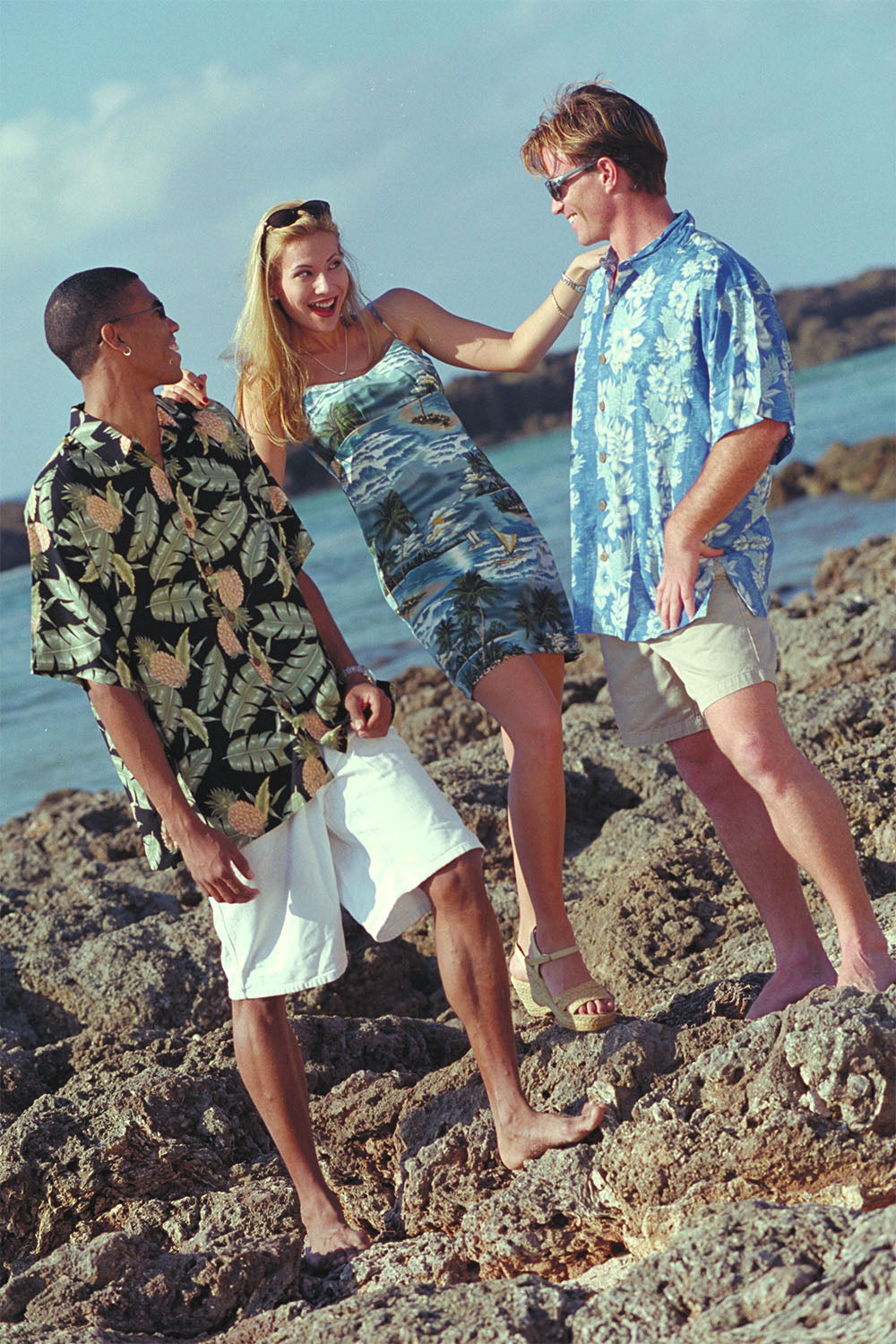 Angel having fun with Casey and Jason in a spaghetti hawaiian dress