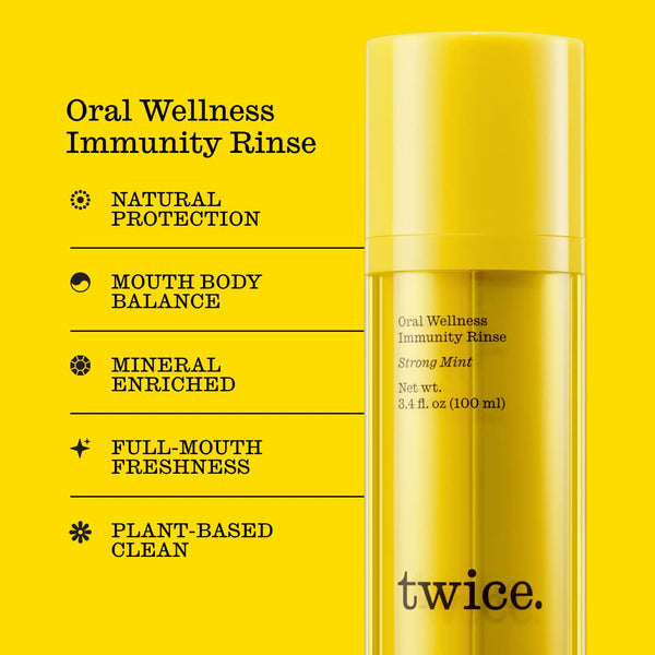 A Twice Oral Wellness Immunity Rinse bottle next to the text "Oral Wellness Immunity Rinse. Natural Protection. Mouth Body Balance. Mineral Enriched. Full-Mouth Freshness. Plant-Based Clean.