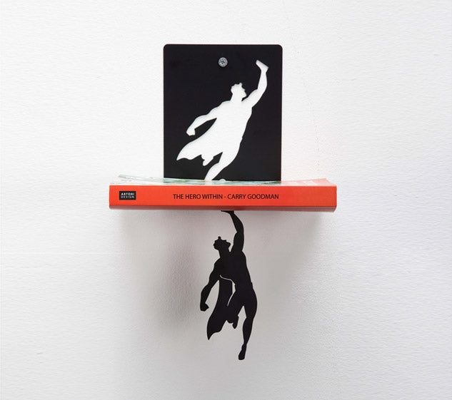 supershelf-bookend-makes-it-look-like-superman-is-holding-up-your-books