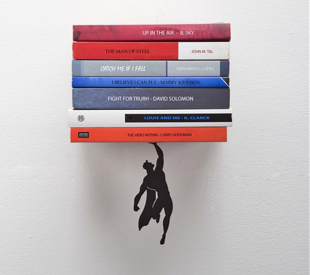 supershelf-bookend-makes-it-look-like-superman-is-holding-up-your-books