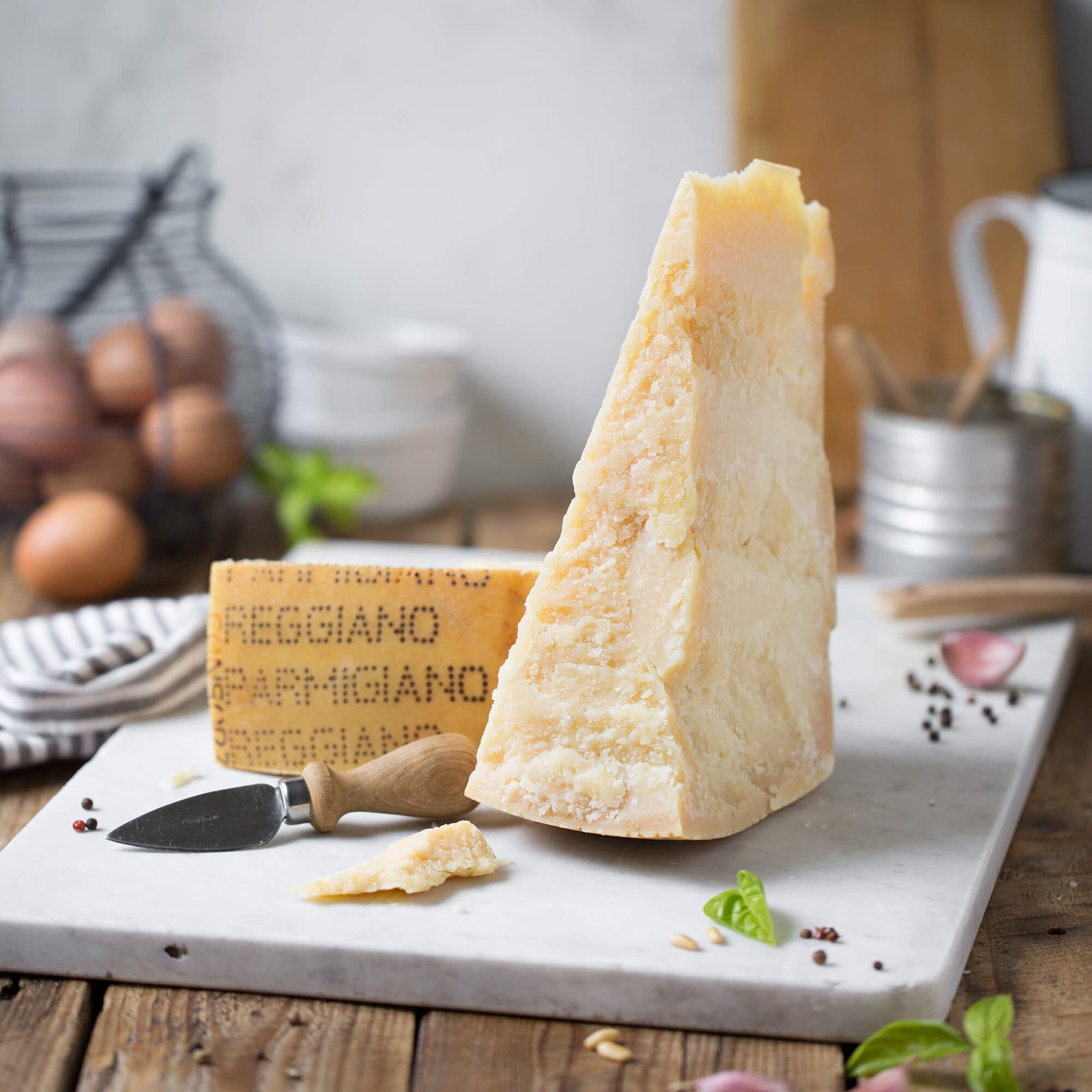 Parmigiano Reggiano PDO from the hills 24 months, 1,350 kg + cheese grater  + cheese container + cheese knife