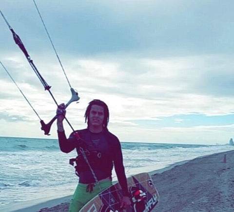 person holding kite handlebar