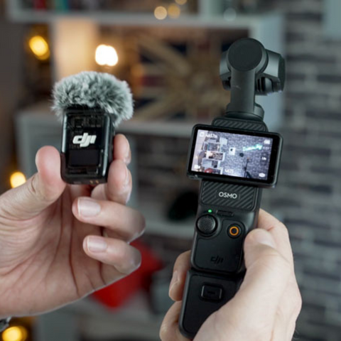 DJI Pocket 3 camera alongside the wireless microphone attachment