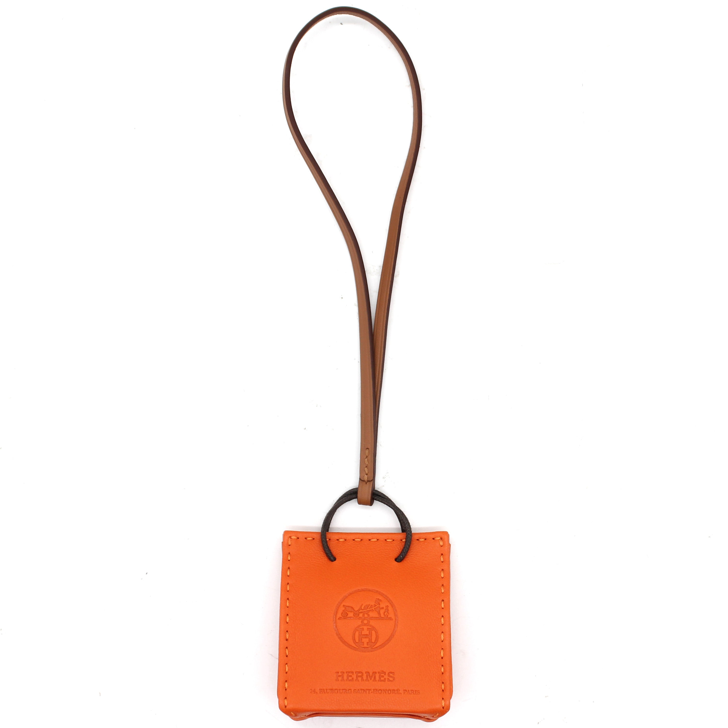 image of Debossed Logo Bag Charm