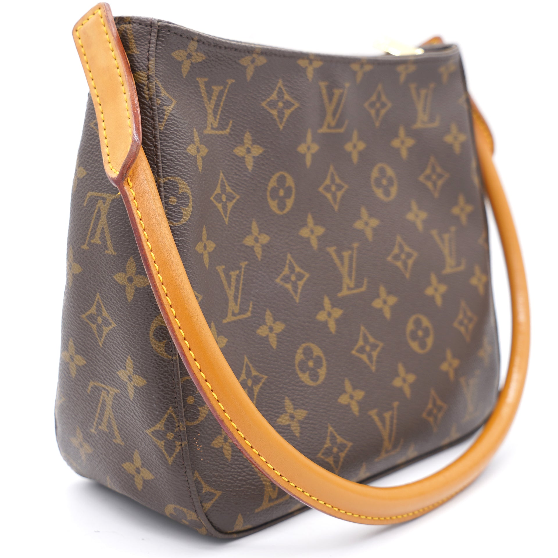 The Louis Vuitton Loop Bag Is an Ode to the Past - PurseBlog