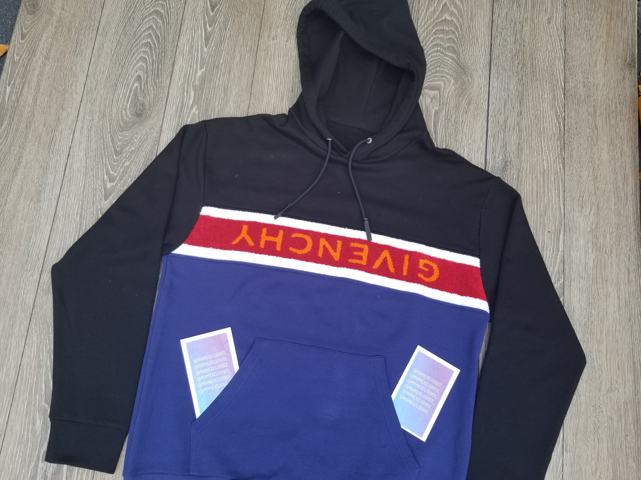 givenchy hoodie upside down