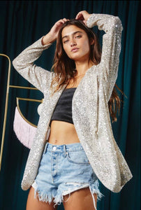 Take any look to the next level with this soft stretch super cool oversized sequin blazer. This effortless blazer is the perfect piece to take your outfit up a notch.  